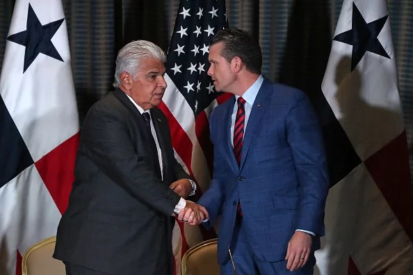 Panama's President Jose Raul Mulino shakes hands with US Secretary of Defense Pete Hegseth during the signing of a bilateral agreement, in Panama City on April 9, 2025. Hegseth arrived in Panama for the regional security summit and to reinforce the Trump administration's continued interest over the canal.