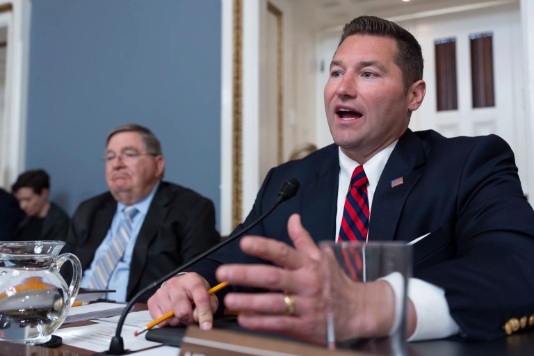 Rep. Guy Reschenthaler (R-PA) joined at left by Rep. Michael Burgess (R-TX), chairman of the the House Rules Committee, as the panel prepares to advance a contempt of Congress resolution from the Oversight Committee against Attorney General Merrick Garland for not complying with a subpoena at the Capitol in Washington, Tuesday, June 11, 2024.