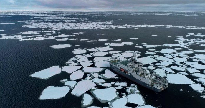 Norwegian research vessel RV Kronprins Haakon navigates through sea ice.