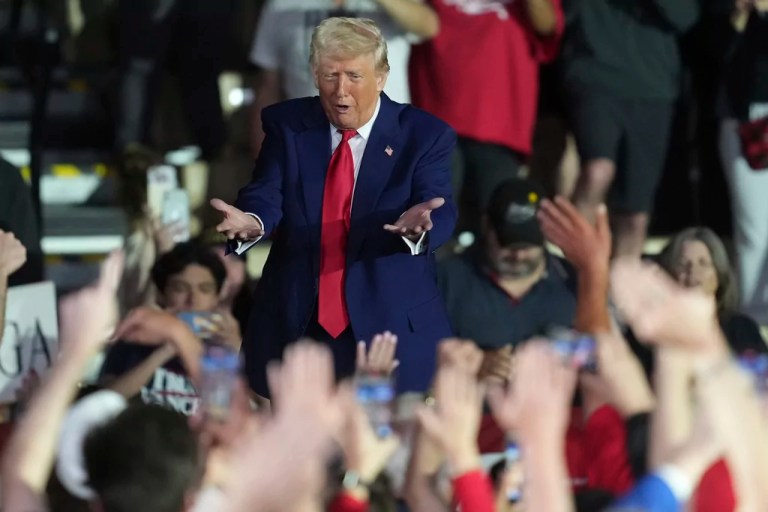 President Donald Trump gestures after speaking at Macomb Community College, Tuesday, April 29, 2025, in Warren Mich. (AP Photo/Paul Sancya)