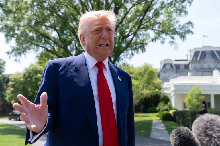 President Donald Trump speaks to reporters as he leaves the White House en route to attend a rally in Macomb County, Michigan, to mark the 100th day of his second term in office, Tuesday, April 29, 2025, in Washington.