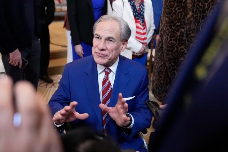 Gov. Greg Abbott (R-TX) talks after President Donald Trump signed an executive order barring transgender female athletes from competing in women's or girls' sporting events in the East Room of the White House, Wednesday, Feb. 5, 2025, in Washington.