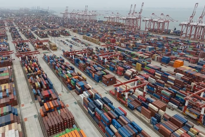 Shipping containers are seen ready for transport at the Guangzhou Port in the Nansha district in southern China's Guangdong province on Thursday, April 17, 2025.