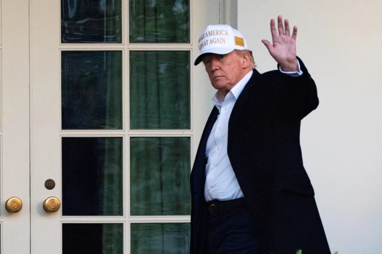 President Donald Trump waves outside the Oval Office as he arrives at the White House, Sunday, April 27, 2025, in Washington.