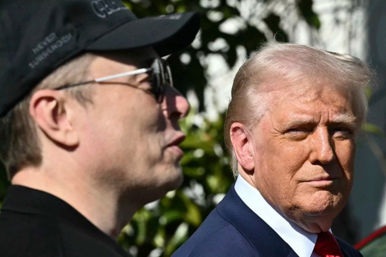 President Donald Trump and Tesla CEO Elon Musk talk with to reporters near Tesla vehicles on the South Lawn of the White House Tuesday, March 11, 2025, in Washington.