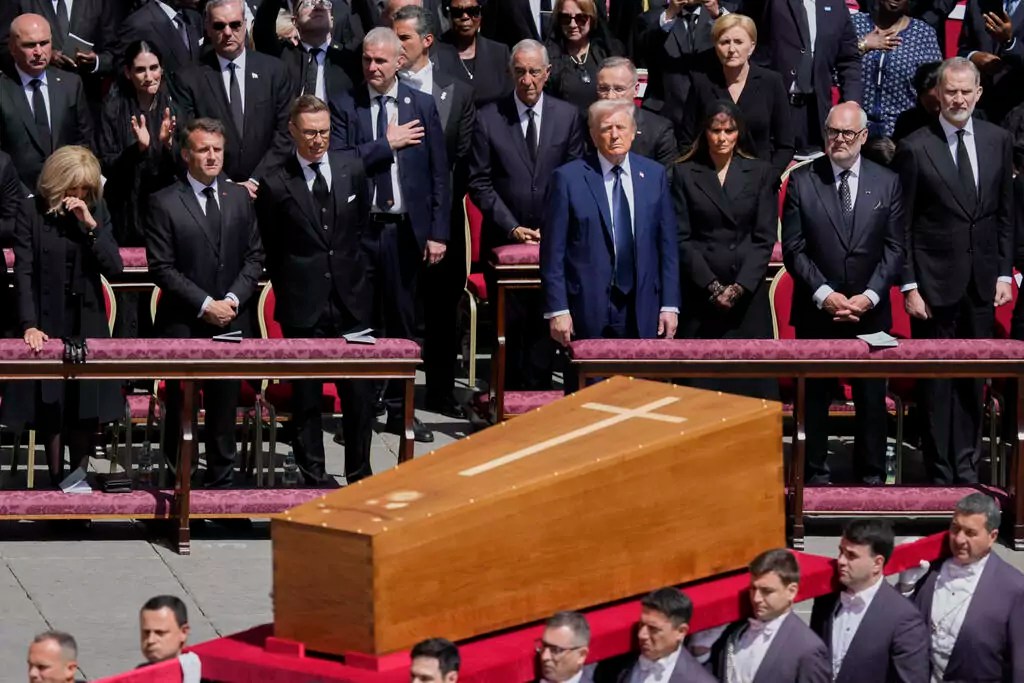 Trump pays his respects to a pope who publicly and pointedly disagreed with him