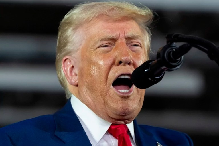 President Donald Trump speaks on his first 100 days at Macomb County Community College Sports Expo Center, Tuesday, April 29, 2025, in Warren, Michigan.