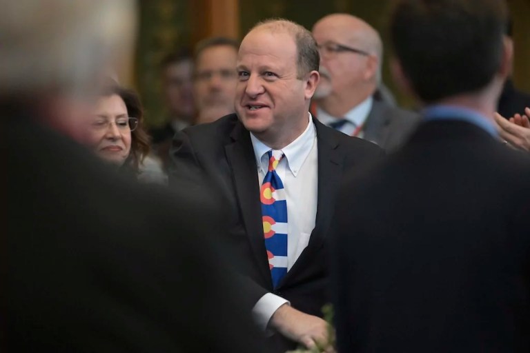 Colorado governor signs restrictions on purchasing semiautomatic weapons into law