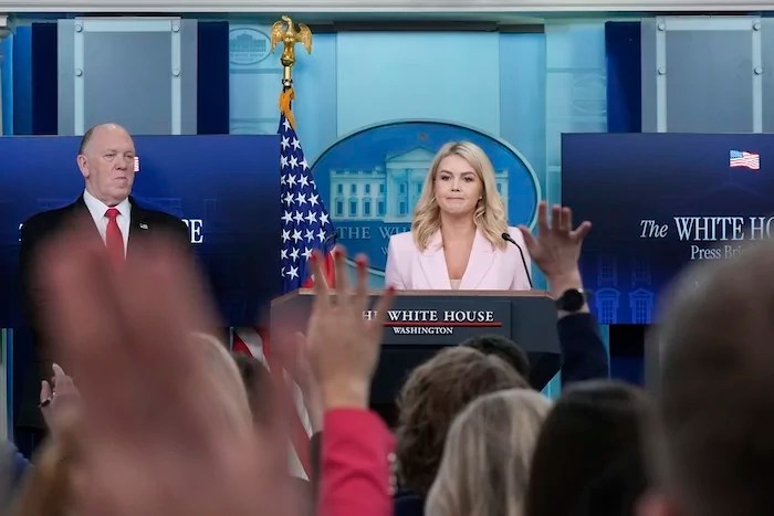 White House press secretary Karoline Leavitt, with White House border czar Tom Homan, speaks with reporters in the James Brady Press Briefing Room at the White House, Monday, April 28, 2025, in Washington. (AP Photo/Alex Brandon)
