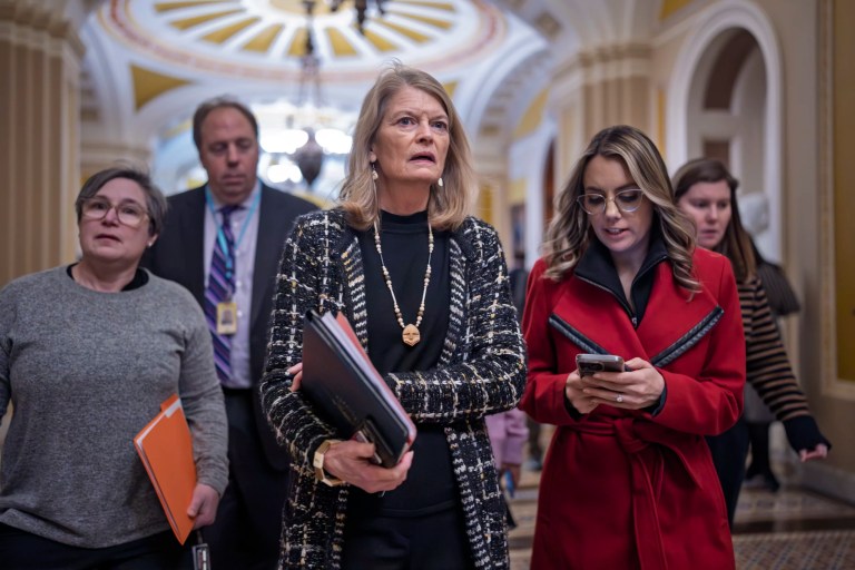 Sen. Lisa Murkowski (R-AK) walks to the chamber as senators gather for the final vote on Kash Patel, President Donald Trump's nominee for FBI director, at the Capitol in Washington, Thursday, Feb. 20, 2025.