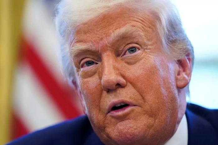 President Donald Trump speaks as he signs executive orders in the Oval Office of the White House Wednesday, April 9, 2025, in Washington. (Pool via AP)