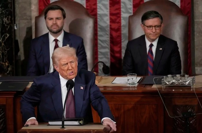 President Donald Trump addresses a joint session of Congress in the House chamber at the U.S. Capitol in Washington, Tuesday, March 4, 2025, as Vice President JD Vance and House Speaker Mike Johnson (R-LA) listen.