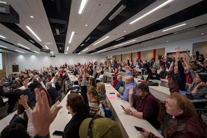 Concerned citizens raise their hands during a GOP town hall meeting with Reps. Celeste Malloy and Mike Kennedy (R-UT), Thursday, March 20, 2025, in Salt Lake City.