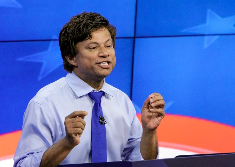 FILE - In this June 20, 2018, file photo, Michigan Democratic gubernatorial candidate Shri Thanedar gestures during a debate in Grand Rapids, Mich. Michigan voters who twice delivered the governorship to a Republican computer executive-turned-venture capitalist are again being wooed by a wealthy outsider businessman with no political experience for the top post _ this time a Democrat. Thanedar, who was unknown until six months ago, has spent millions of his fortune on TV ads. (Michael Buck/Wood-TV8 via AP, POOL, File)