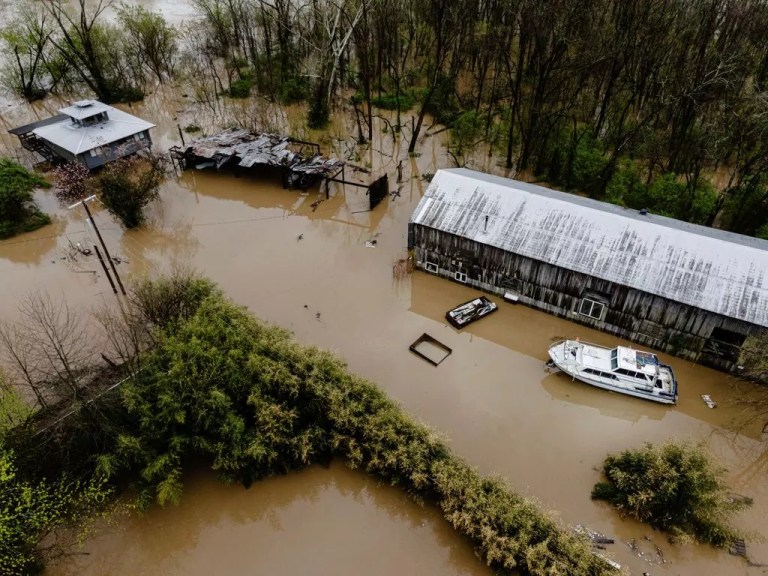 At least 16 dead in flooding and tornadoes as storms slash from Texas to Ohio