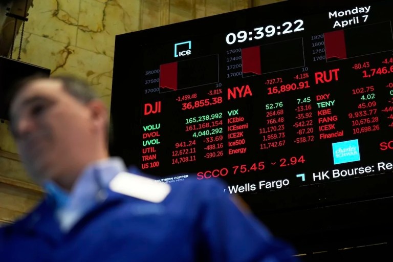 Electronic displays show financial information on the floor at the New York Stock Exchange in New York, Monday, April 7, 2025.