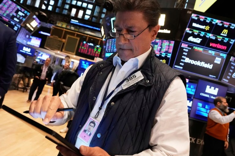 Trader Anthony Carannante works on the floor of the New York Stock Exchange, Friday, April 4, 2025.