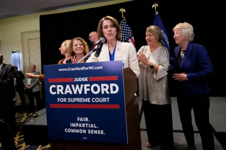 Wisconsin Supreme Court candidate Susan Crawford, center, speaks during her election night party after winning the election Tuesday, April 1, 2025, in Madison.