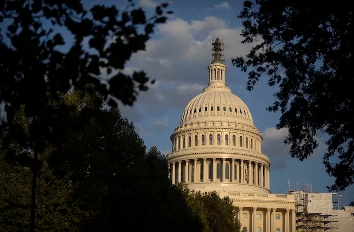 The late-day sun shines on the U.S. Capitol building