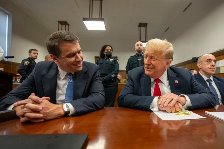 Former President Donald Trump shares a light moment with his lawyer Todd Blanche while he attends his trial at Manhattan Criminal Court, Tuesday, May 28, 2024, in New York.