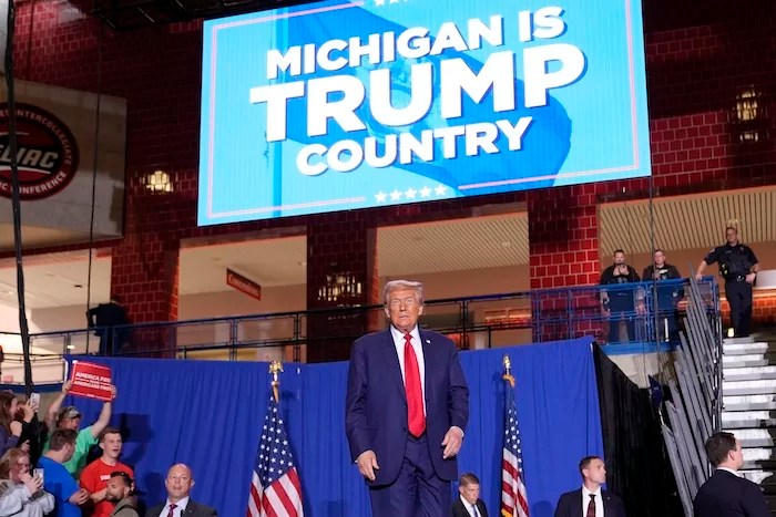 Former President Donald Trump, Republican presidential nominee, arrives at a campaign event at the Ryder Center at Saginaw Valley State University, Thursday, Oct. 3, 2024, in University Center, Michigan.