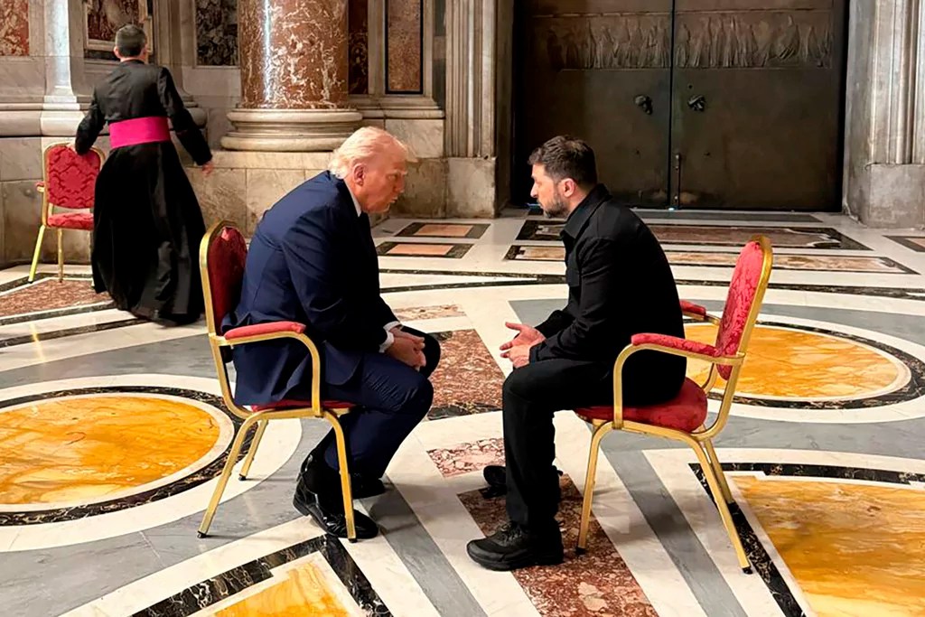 In this photo provided by the Ukrainian Presidential Press Office, Ukraine's President Volodymyr Zelenskyy, right, and President Donald Trump, talk as they attend the funeral of Pope Francis in Vatican, Saturday, April 26, 2025.
