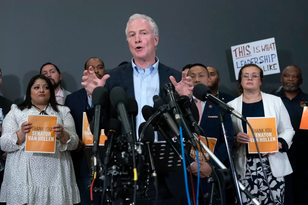 Sen. Chris Van Hollen, D-Md., speaks during a news conference upon his arrival from meeting with Kilmar Abrego Garcia in El Salvador, at Washington Dulles International Airport, in Chantilly, Va., Friday, April 18, 2025.