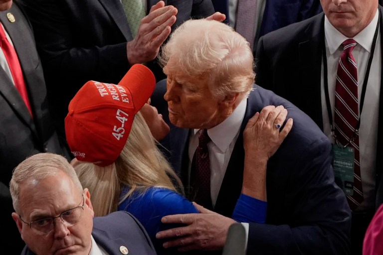 President Donald Trump greets Rep. Marjorie Taylor Greene
