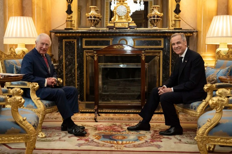 King Charles III, left, holds an audience with Canadian Prime Minister Mark Carney, right, at Buckingham Palace in London, England, Monday, March 17, 2025.