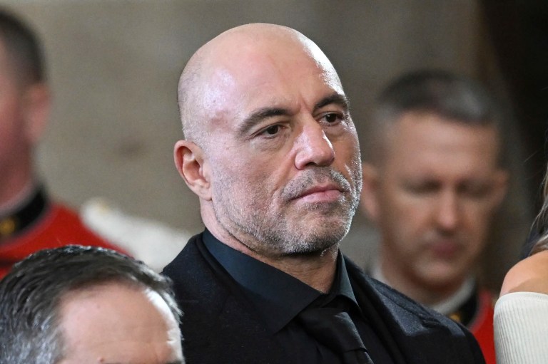 Joe Rogan stands for a benediction after President Donald Trump was sworn in during the 60th Presidential Inauguration in the Rotunda of the U.S. Capitol in Washington, Jan. 20, 2025.