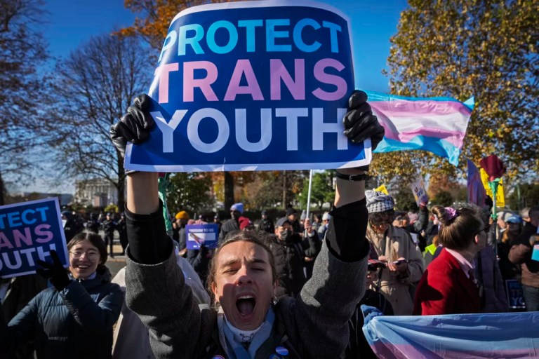 Supporters of transgender rights rally by the Supreme Court, Dec. 4, 2024, in Washington