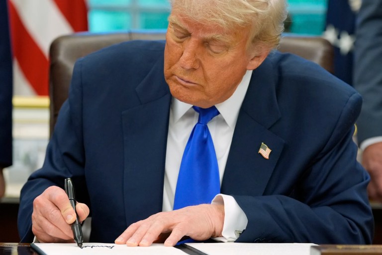 President Donald Trump signs executive orders and proclamations in the Oval Office of the White House, Monday, May 5, 2025, in Washington.