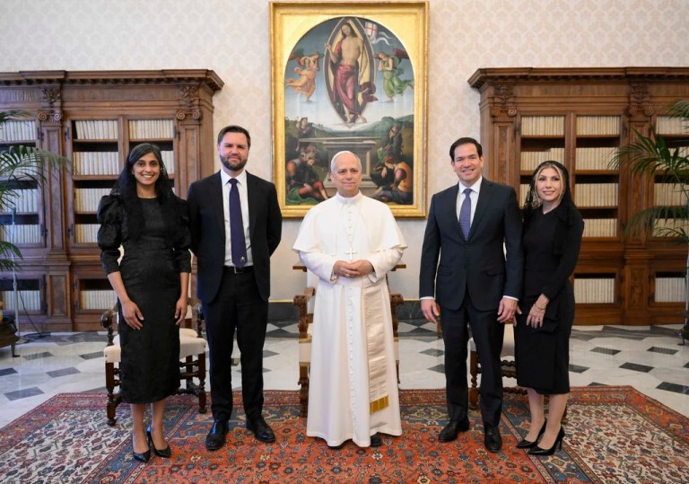 Pope Leo XIV stands for a family photo with Vice President JD Vance, second from left, his wife Usha Vance, Secretary of State Marco Rubio, second from right, and his wife Jeanette Dousdebes Rubio, on the occasion of their meeting at the Vatican, Monday, May 19, 2025.