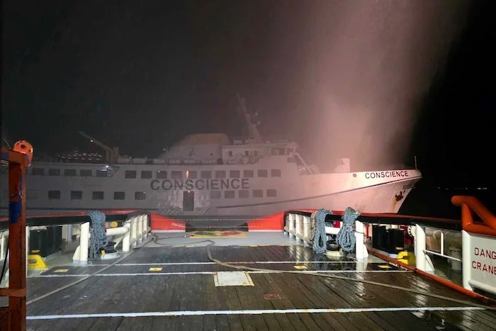 This photo provided by the Cyprus government and taken from the EDT ship AEOLUS shows the Conscience, after a drone struck the vessel carrying aid to Gaza off the coast of Malta, Friday, May 2, 2025.