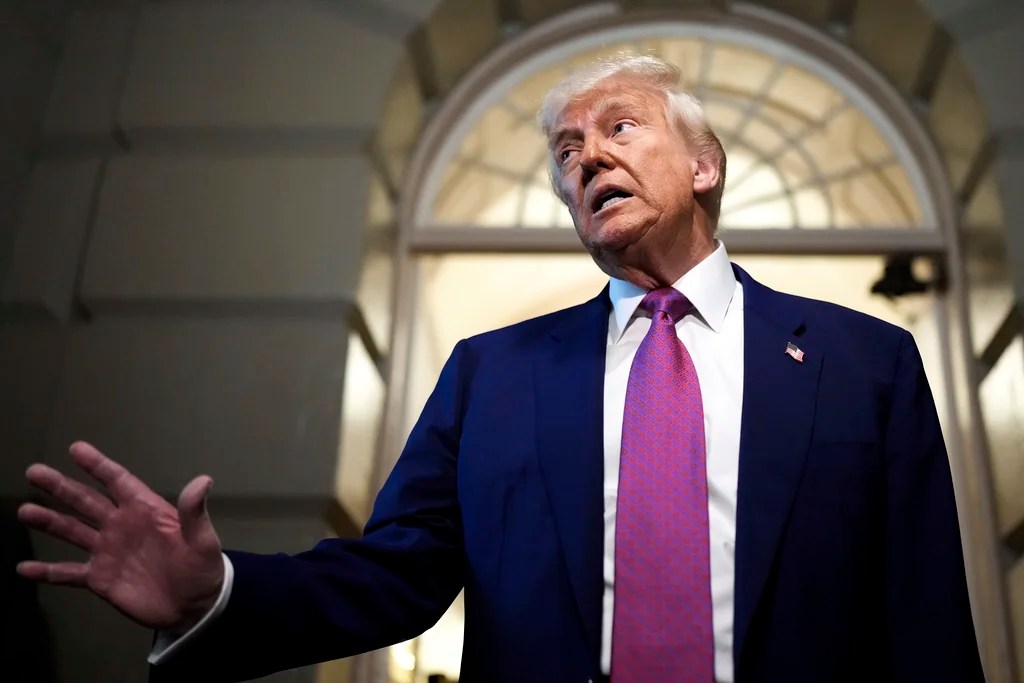 President Donald Trump speaks to reporters after departing a House Republican conference meeting, Tuesday, May 20, 2025, at the U.S. Capitol in Washington.