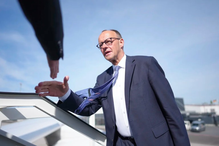 German Chancellor Friedrich Merz boards an aircraft of the German air force in Berlin, Germany, Wednesday, May 7, 2025.