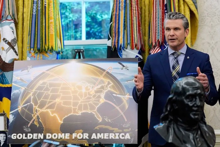Defense Secretary Pete Hegseth speaks during an event with President Donald Trump in the Oval Office of the White House, Tuesday, May 20, 2025, in Washington.