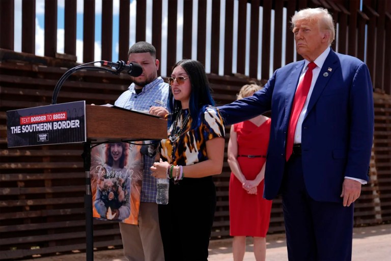 President Donald Trump comforts Alexis Nungaray and James Guevara, mother and uncle of Jocelyn Nungaray, during an event along the southern border with Mexico, Thursday, Aug. 22, 2024, in Sierra Vista, Arizona.