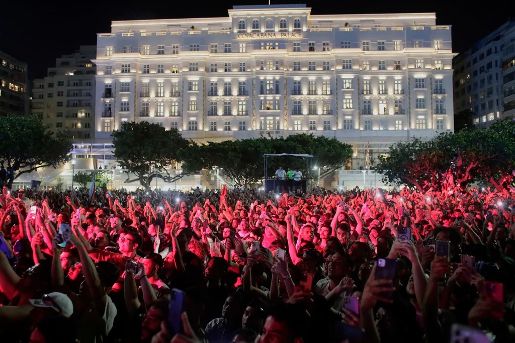 Fans watch Lady Gaga rehearse a day ahead of her free concert, on Copacabana beach, in Rio de Janeiro, Friday, May 2, 2025.