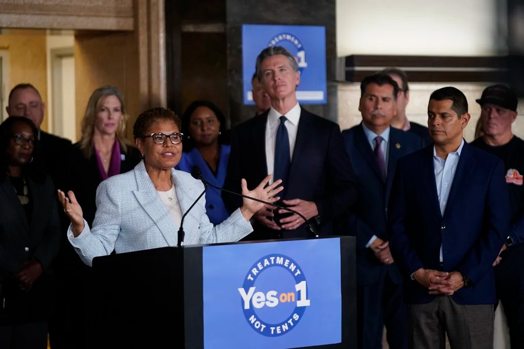 Los Angeles Mayor Karen Bass, at podium, with California Gov. Gavin Newsom speak in support of Proposition 1, a $6.38 billion bond measure, to urge support for Proposition 1 on the March 5, 2024 ballot, at a news conference in the Los Angeles General Medical Center in Los Angeles on Wednesday, Jan. 3, 2024. California's Proposition 1 looks to overhaul California's mental health funding system, with a $6.4 billion bond to expand access for hundreds of thousands of Californians, fund substance abuse treatment, and help to get people suffering from mental health off the streets.