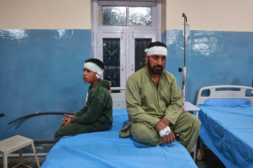 A father and a son who live in a village near the Line of Control between India and Pakistan and got injured in Pakistani shelling get treated in a hospital in Uri, Indian controlled Kashmir, Wednesday, May 7, 2025.