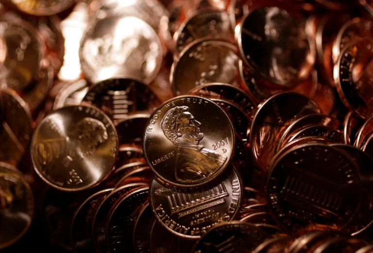 Pennies shine in a bin at the U.S. Mint in Denver on Wednesday, Aug. 15, 2007. Because of a surge in the price of zinc and copper, it now costs the U.S. Mint almost 2 cents to produce a penny. That has some in Congress seeking a change in the way the coins are made, if not removing them circulation altogether. The the nation's sole supplier of zinc 