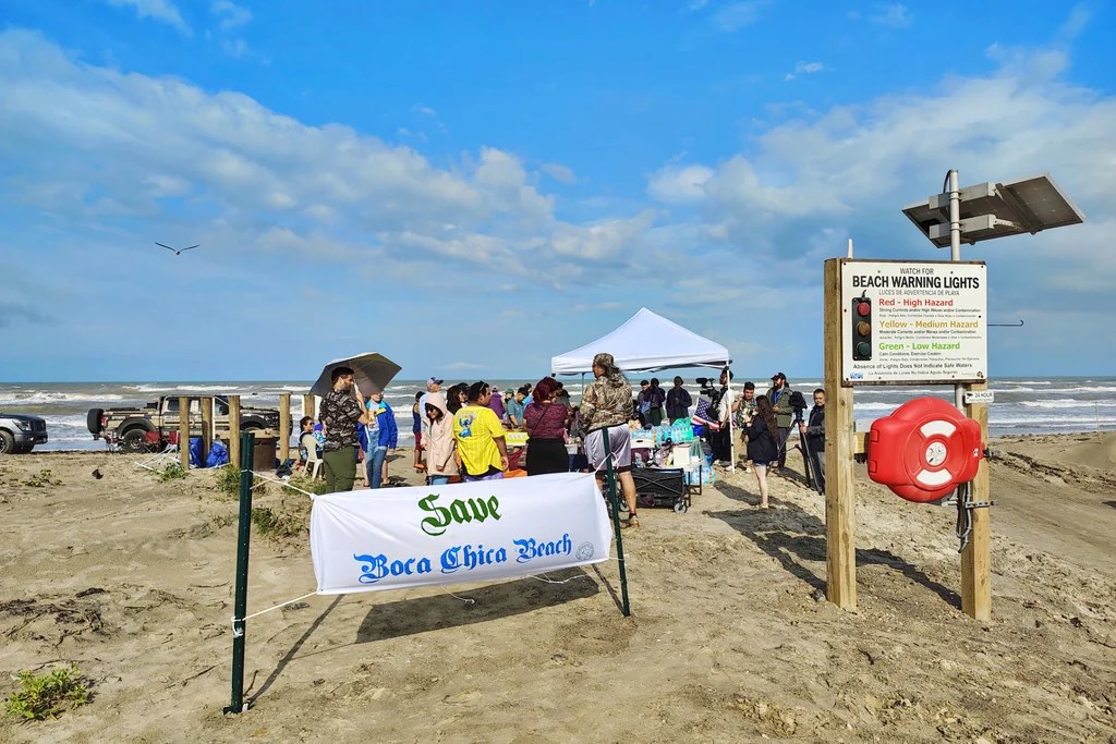 People protest at Boca Chica beach, Texas, on Saturday afternoon, May 3, 2025, before an incorporation election that would turn Starbase into an official Texas city.