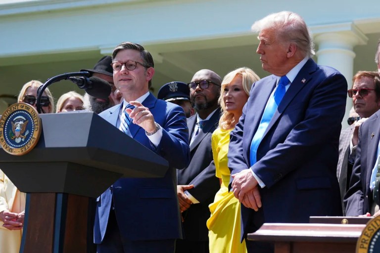 House Speaker Mike Johnson (R-LA) speaks as President Donald Trump, right, listens during a National Day of Prayer event in the Rose Garden of the White House, Thursday, May 1, 2025, in Washington.