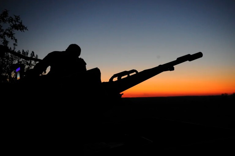 In this photo provided by Ukraine's 127th Separate Brigade of the Territorial Defence press service, a soldier ready to fire against Russian drones attacks near Kharkiv, Ukraine, Saturday, May 24, 2025.