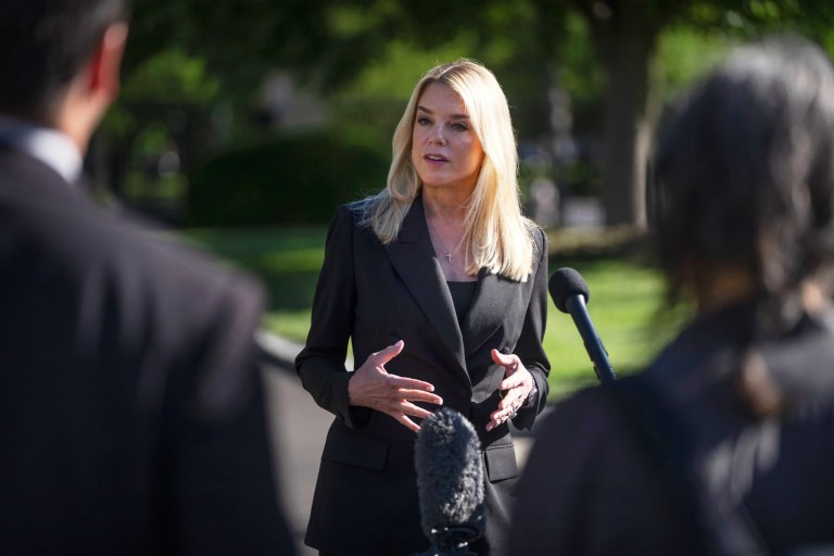 Attorney General Pam Bondi speaks to reporters outside the White House, Wednesday, May 7, 2025, in Washington.