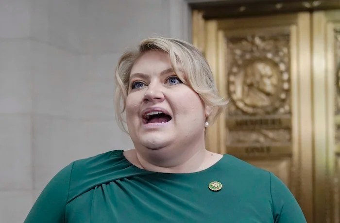 Rep. Kat Cammack, R-Fla., talks with reporters as Republicans hold a caucus meeting at the Capitol in Washington