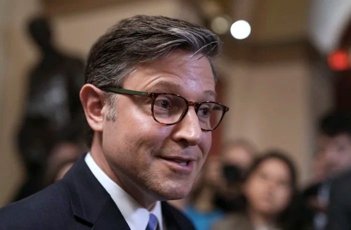 Speaker of the House Mike Johnson, R-La., talks to reporters just after House Republicans narrowly approved their budget framework