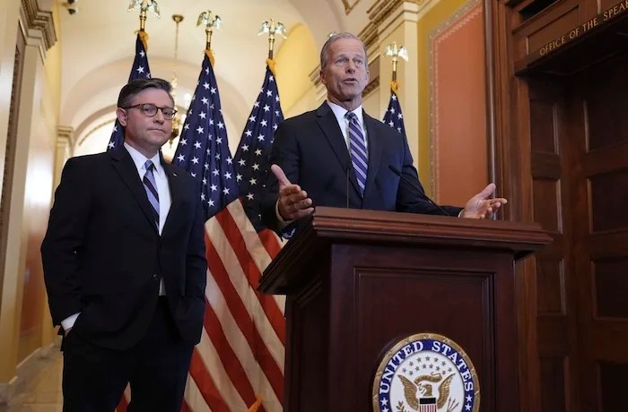 Speaker of the House Mike Johnson, R-La., left, and Senate Majority Leader John Thune, R-S.D., make statements to reporters ahead of vote in the House to pass a bill on President Donald Trump's top domestic priorities of spending reductions and tax breaks.