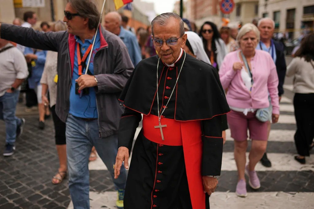 Cardinal Gregorio Rosa Chavez walks to the Vatican, on Wednesday, May 7, 2025, on the day cardinals sequester themselves at the Vatican for the start of a conclave to elect the 267th Roman pontiff, a successor to Pope Francis.